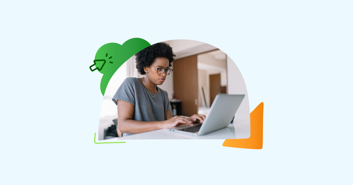 An educators typing on her laptop.