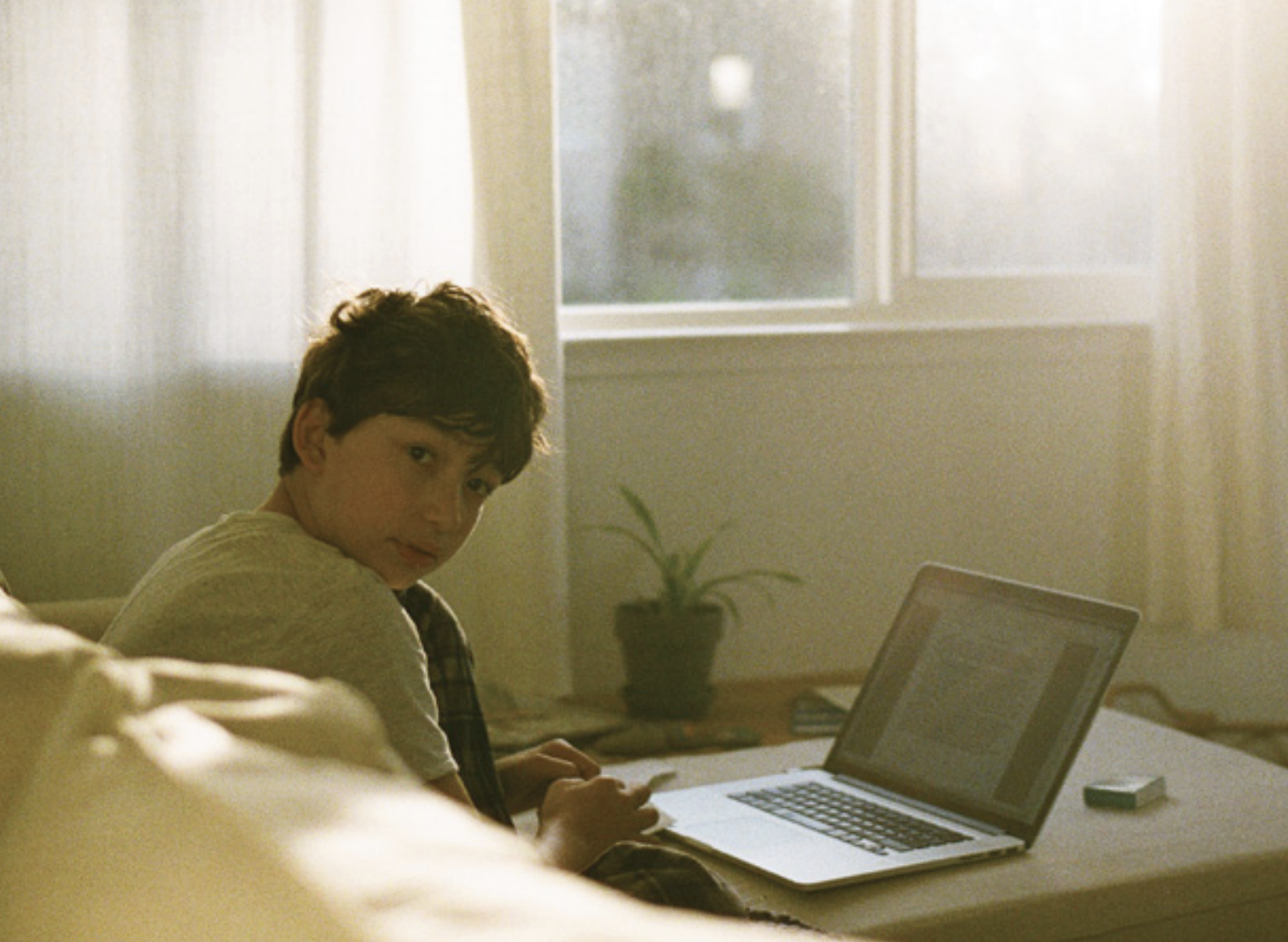 Teen on laptop