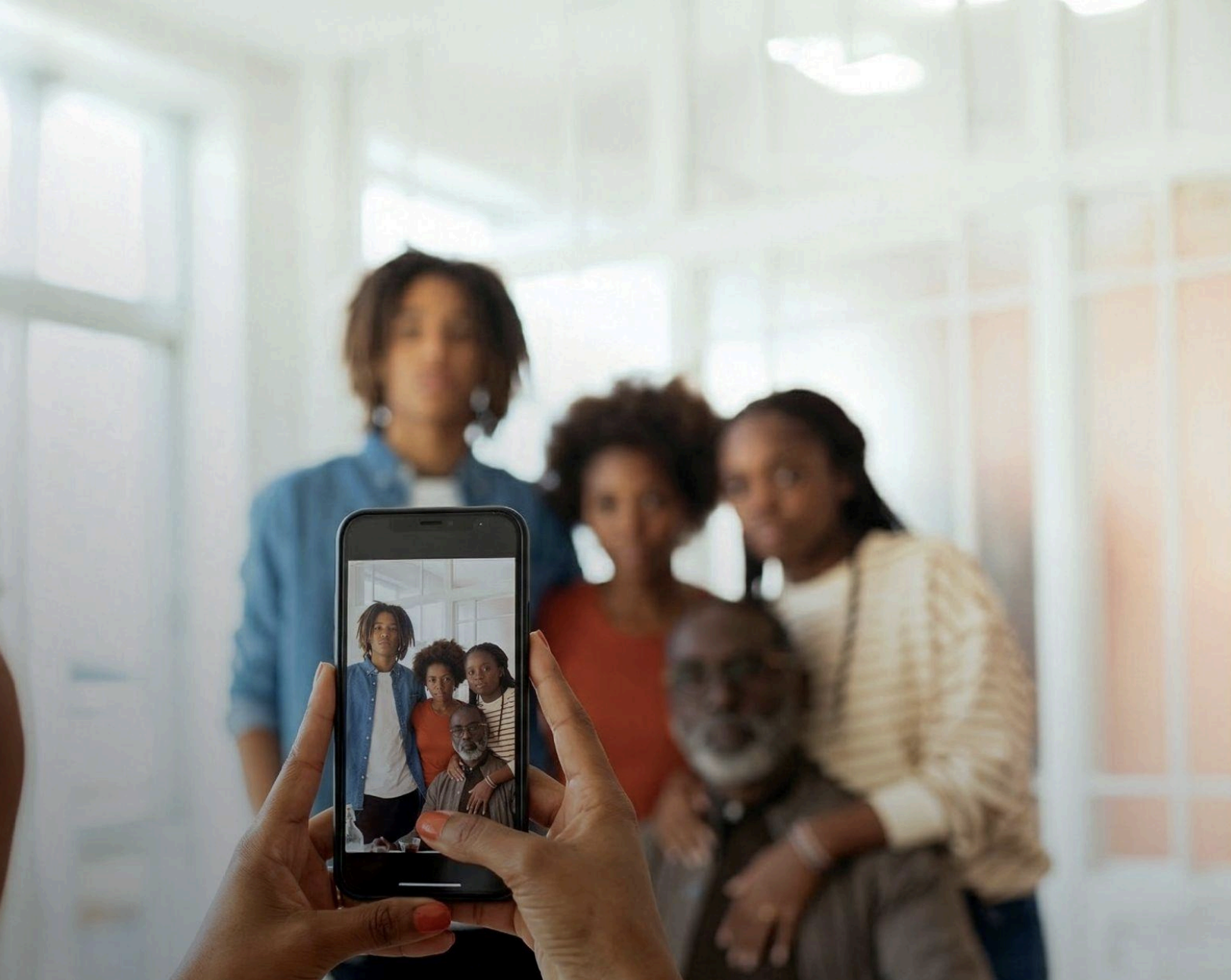 Taking picture of family with a phone