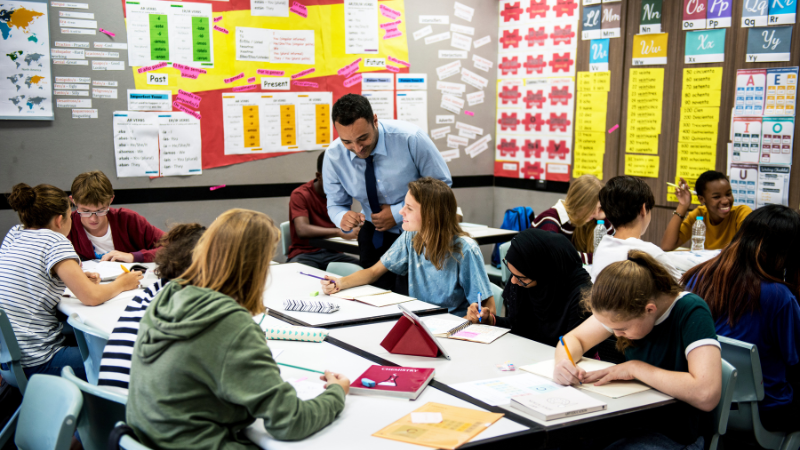 Photo of a teacher leading a lesson in a classroom
