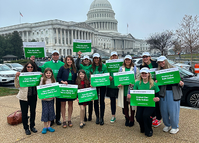 Group of people in front of US Capitol