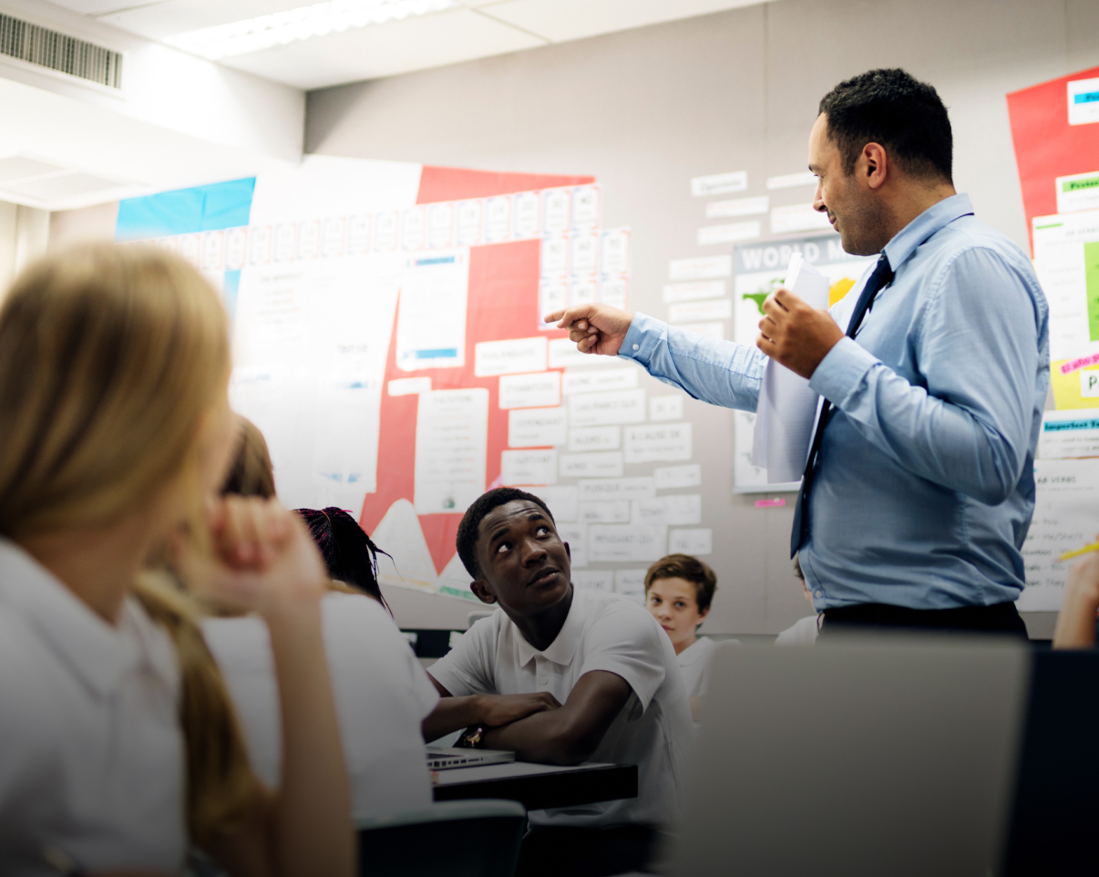 Teacher in front of class teaching