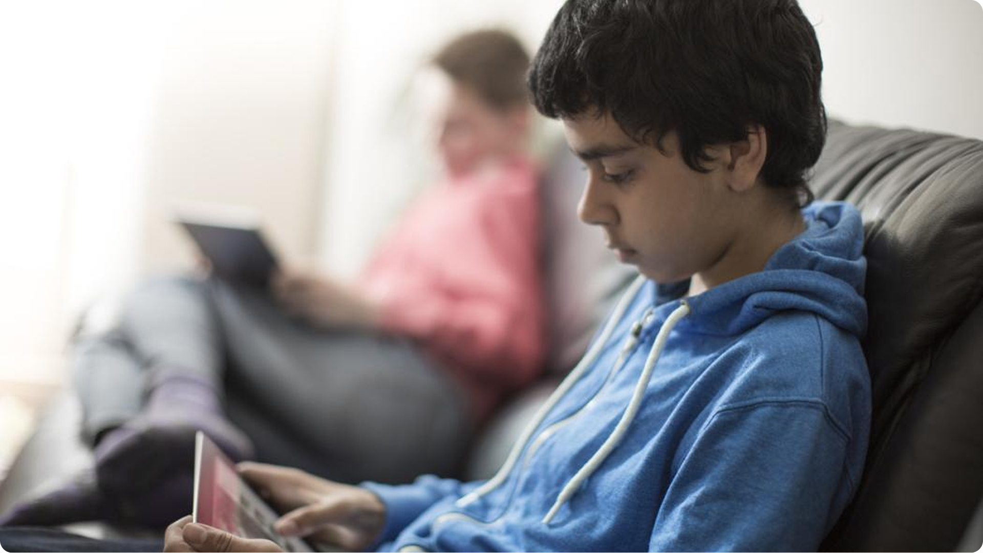 Young person on tablet computer